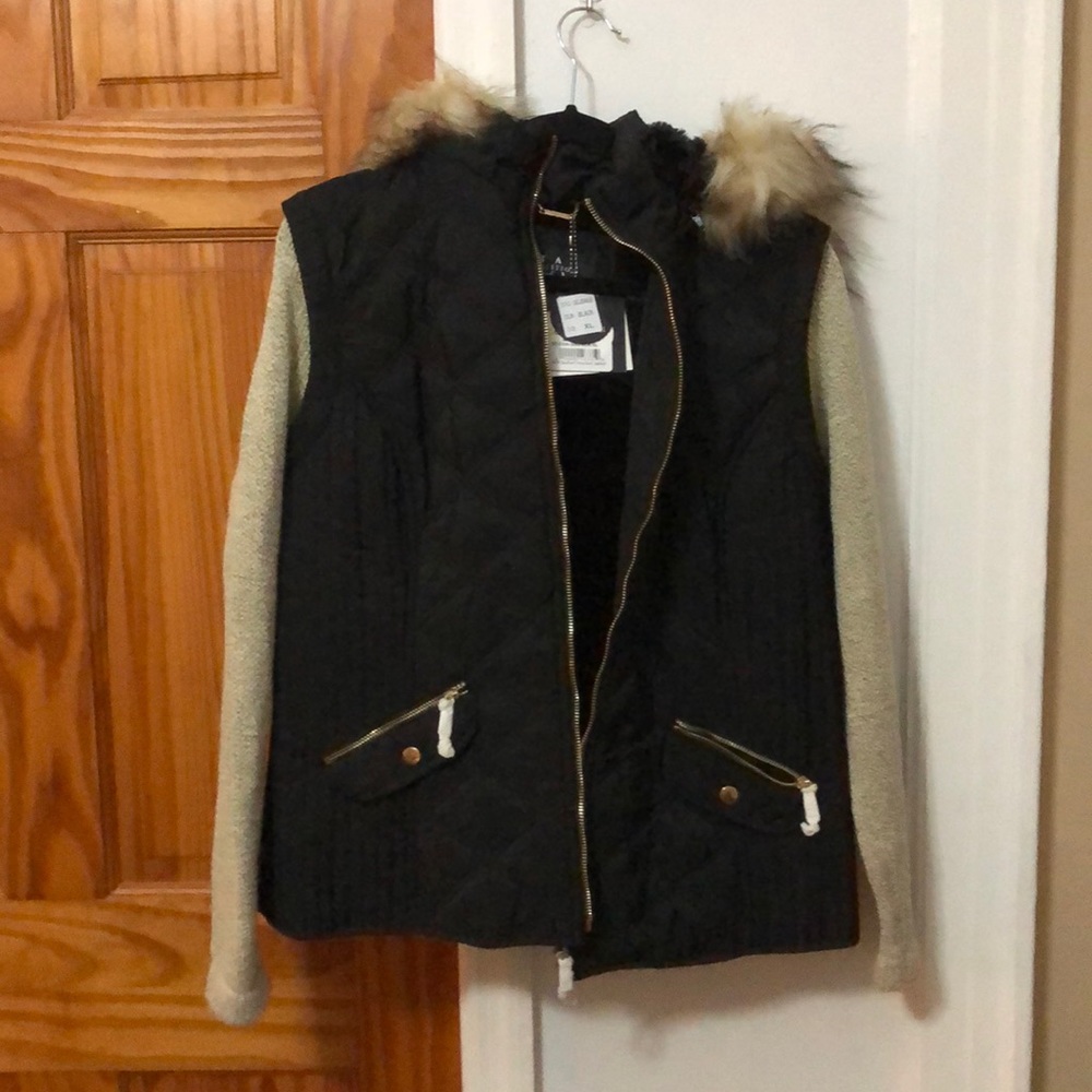 Sweater with vest and hood. One piece
